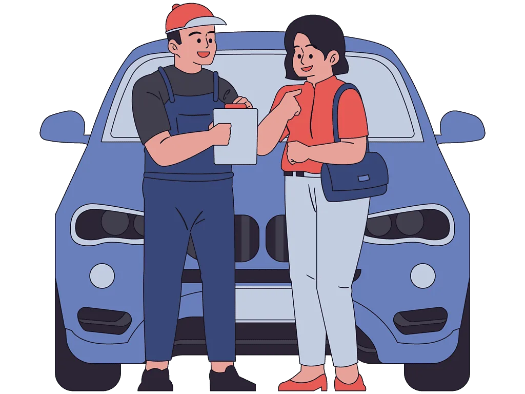 mecànic parlant amb un client al taller.